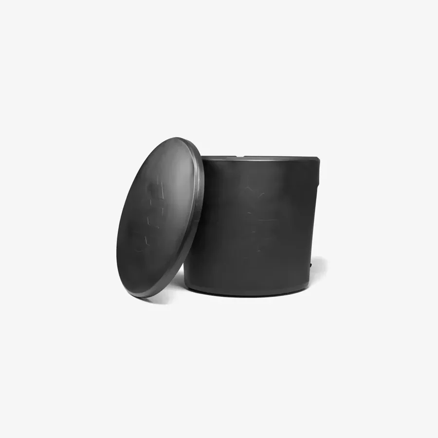 The Ice Barrel 300, a squat black upright plunge barrel photographed on white with its round lid propped beside it